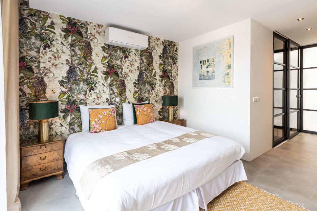 Slaapruimte/ bed longstay suite 19 hotel Goud en Zilver